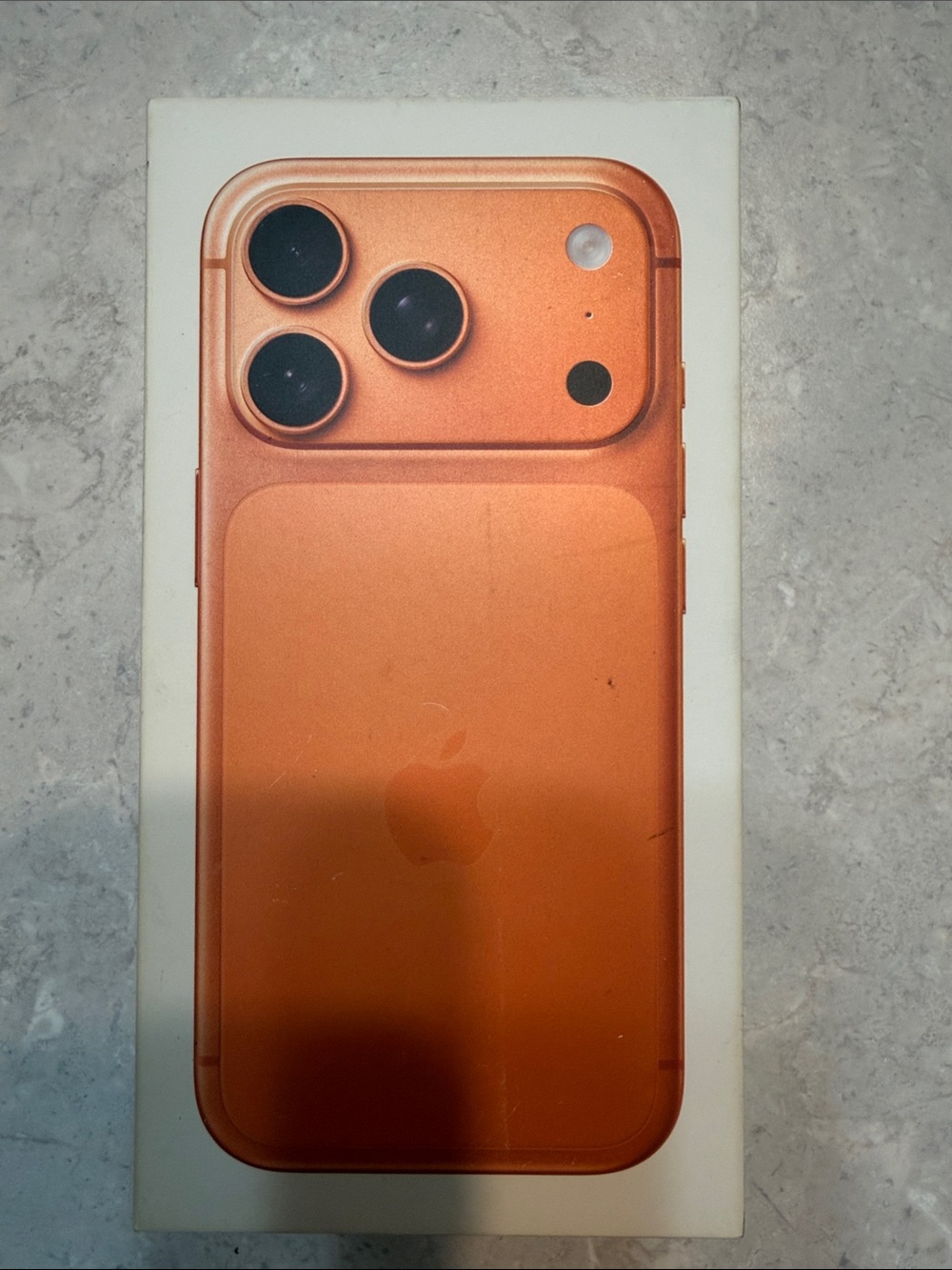 Apple iPhone 17 pro in orange finish with triple camera Box Only !